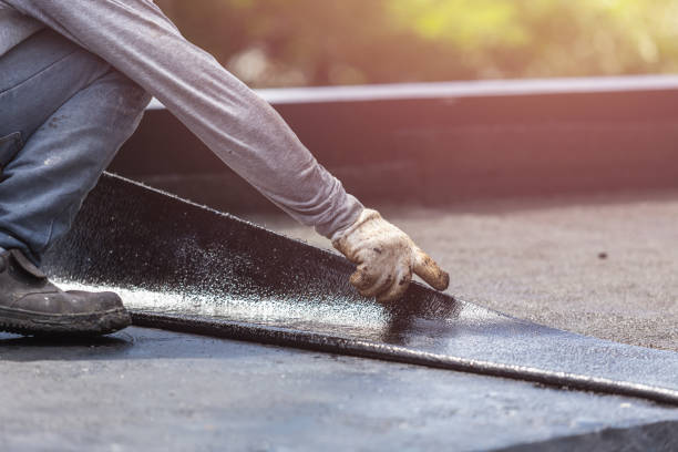 Professional Waterproofing technician working in Charlottesville, IN